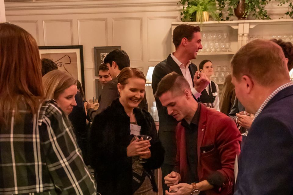 Caleb Hyatt entertaining guests at an upscale corporate reception — available in Indianapolis
