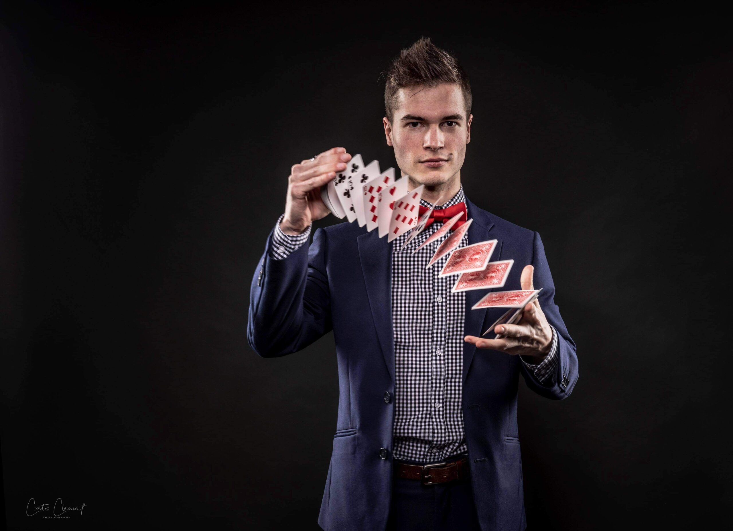 Caleb Hyatt performing close-up magic for guests