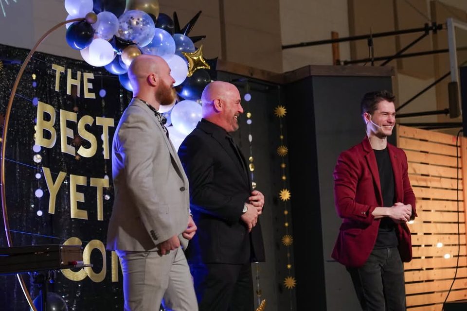 Caleb Hyatt performing a stage set at an evening party